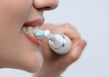 Experience the Buzz: The Advantages of Electric Toothbrushes Over Manual Ones